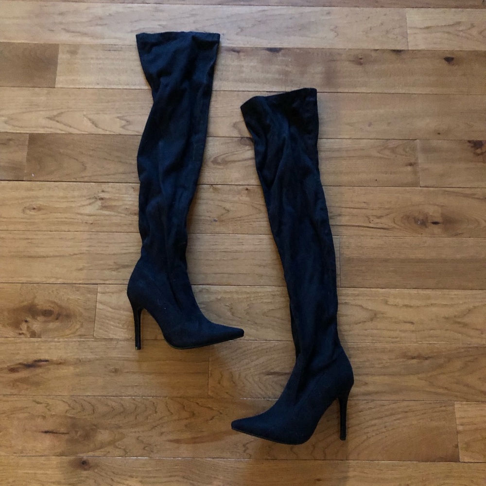 Thigh high pointed toe boots